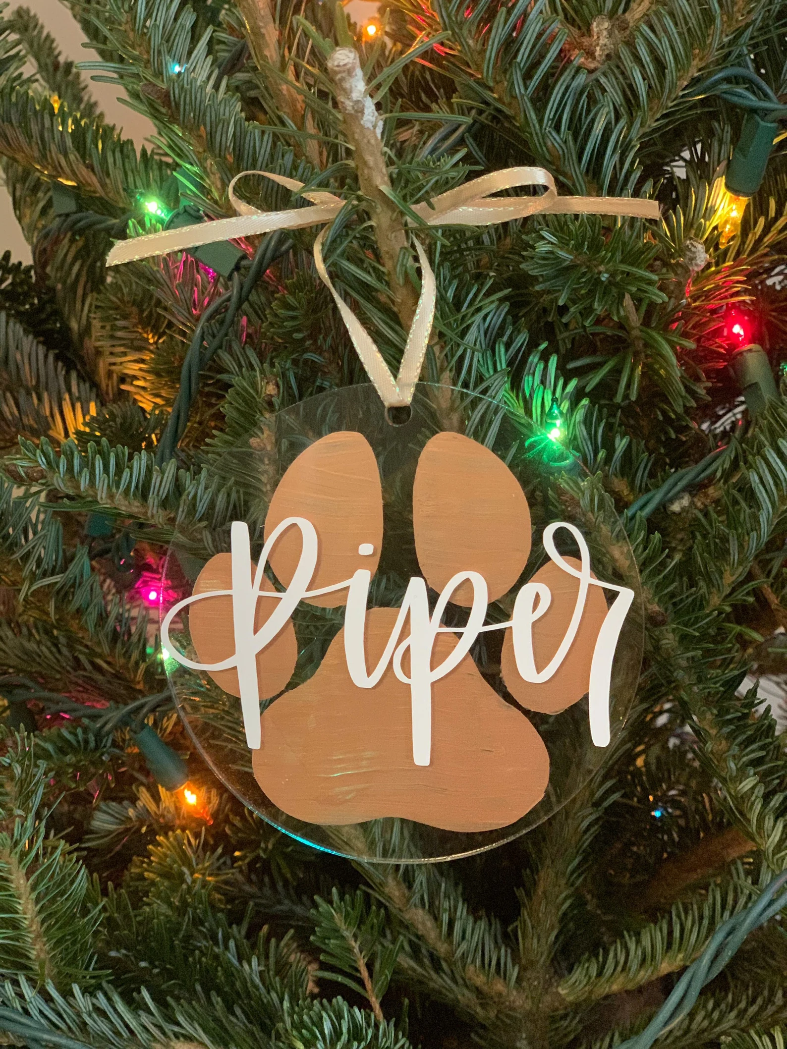 name christmas ornaments hanging on tree