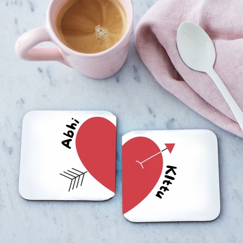 Photo coasters with your name on the table for valentines gift
