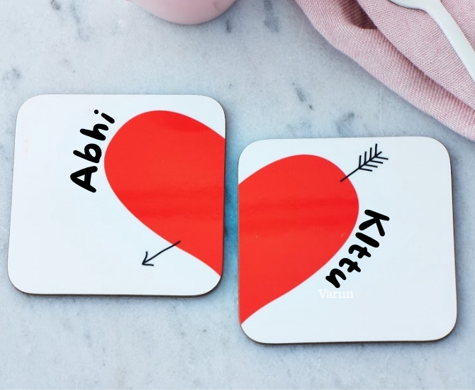 Photo coasters with your name on table for valentine