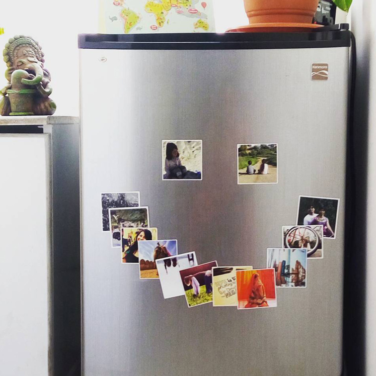 photo magnets arranged in the form of a smile