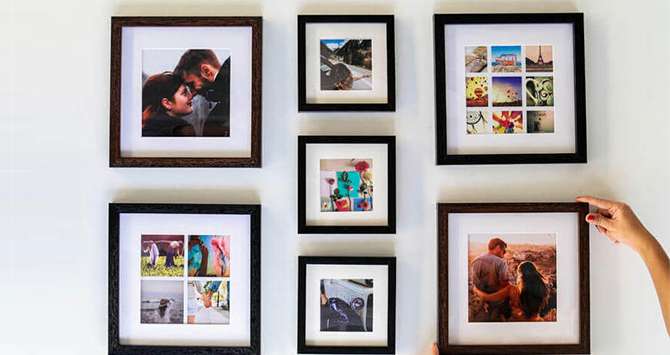 photo frames of different sizes on a table