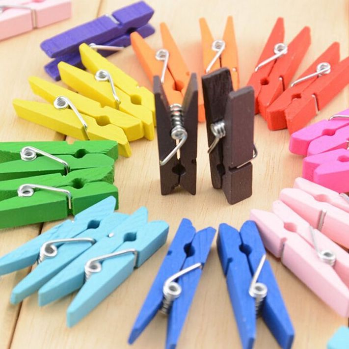 Wooden clips pegs to hang photos